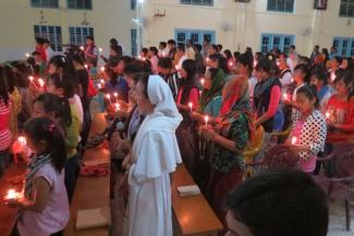Faithful_praying_with_Pope_Francis_in_Miao_diocese_for_persecuted_Christians_in_Middle_East__Credit_Fr_Felix_Anthony_CNA.jpg