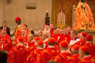 Pope_Francis_surrounded_by_cardinals_during_the_Mass_of_Sts_Peter_and_Paul_June_29_2015_Credit_Bohumil_Petrik_CNA.jpg