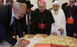 Representatives_of_the_Abrahamic_religions_sign_a_declaration_on_end_of_life_issues_at_the_Vatican_Oct_28_2019_Credit_Vatican_Media.jpeg