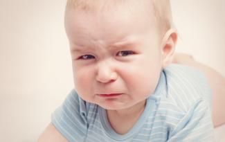 Sad_crying_baby_boy.jpg