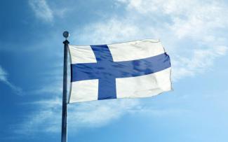 Finland-flag-scaled-e1713802293897-810x500.jpeg