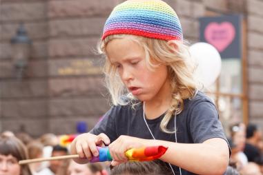 Swedish_boy_at_pride_parade.jpg