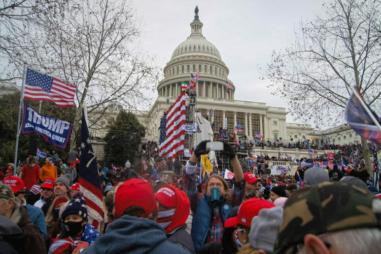 2021_storming_of_the_United_States_Capitol_DSC09254-2_50820534063_retouched-scaled-e1704822476341-810x500.jpg