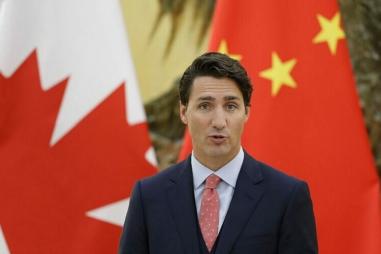 trudeau_china_flag_getty-e1709642525137-810x500.jpg