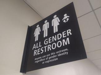 640px-All_gender_restroom_sign_San_Diego_airport.jpg