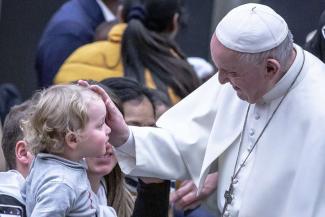 Pope_Francis_blesses_a_child_on_Jan_12_2020_Credit_Daniel_Ibanez_CNA.jpg