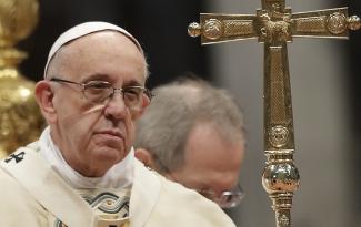 Pope_Francis_frowning_with_cross.jpg