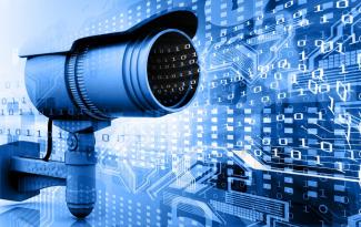 Surveillance_camera_with_digital_world.jpg
