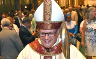 Bishop_Douglas_John_Lucia_of_Roman_Catholic_diocese_of_Syracuse_New_York-810x500.jpg