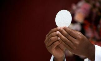 Holy-Communion-scaled-e1738763663477-810x500.jpg