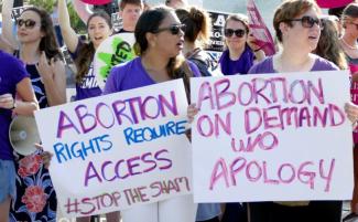 abortion_activists_1-810x500.jpg