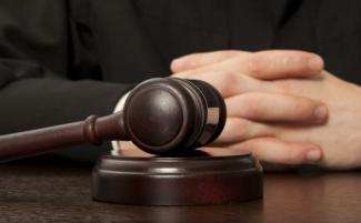 judge_hands_gavel_810_500_75_s_c1-810x500.jpg