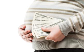 surrogate_mom_with_money-810x500.jpg