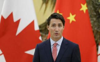 trudeau_china_flag_getty-e1709642525137-810x500.jpg