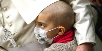 web3-pope-francis-with-sick-child-afp-vincenzo-pinto.jpg